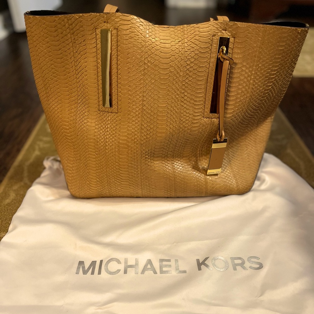 Michael Kors genuine snake skin purse.